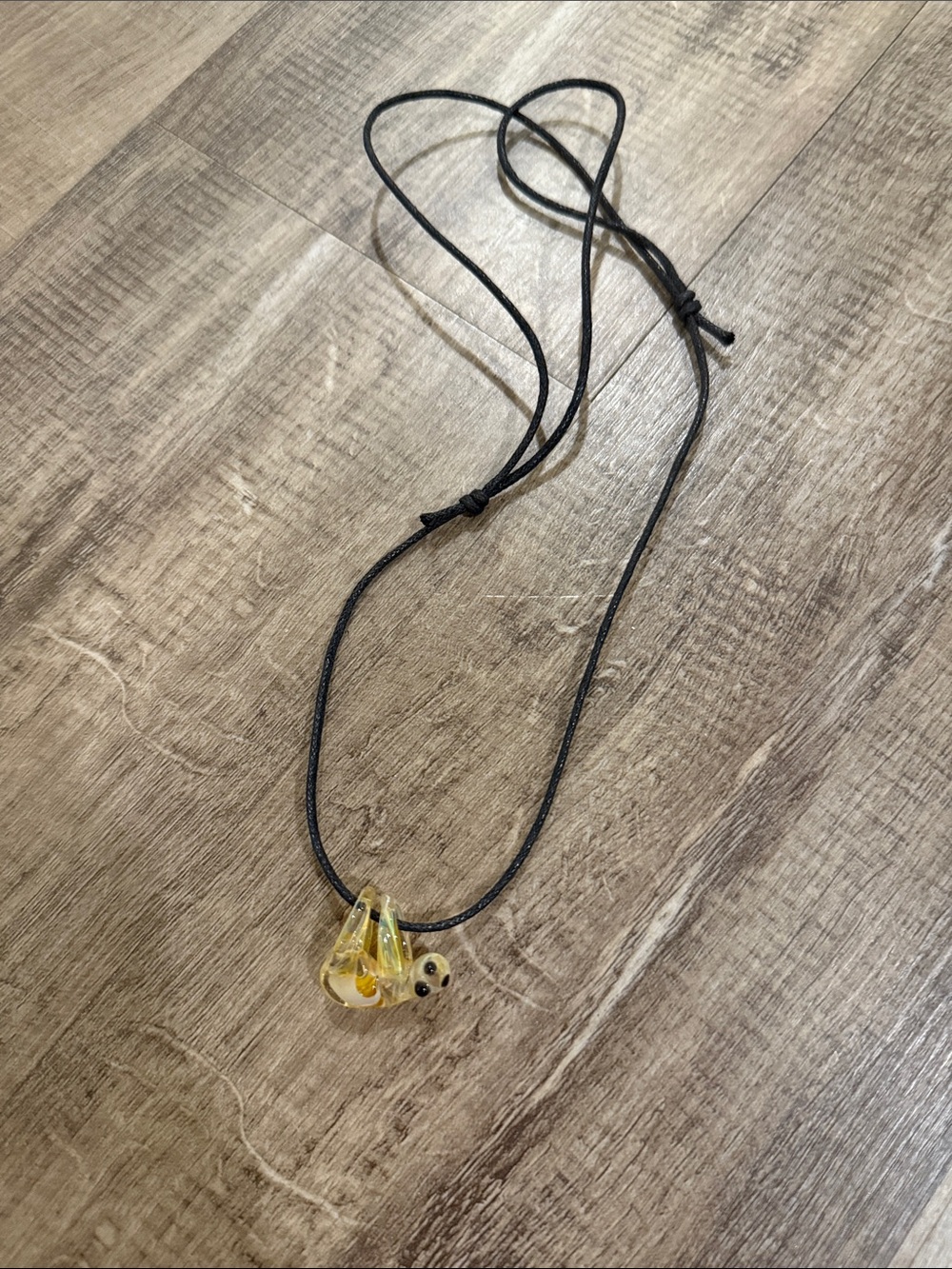 Handcrafted glass blown Yellow Glass Sloth Pendant on Adjustable Black Cord